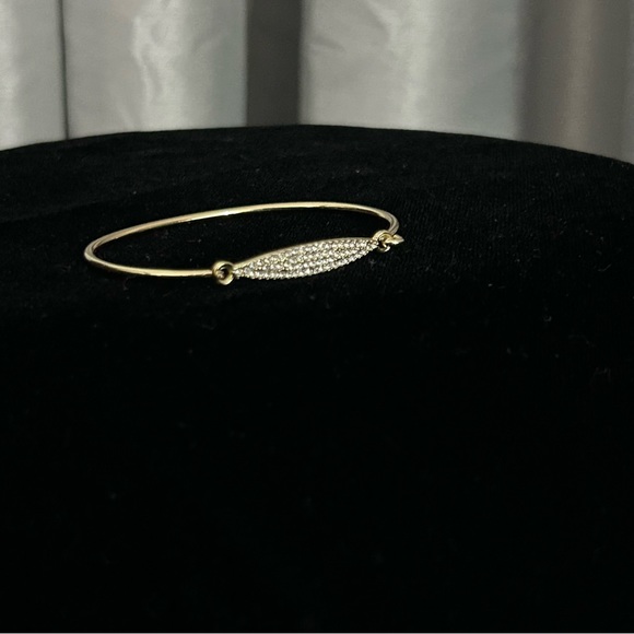 Clear Crystals Set in Gold Tone Latch Bangle Bracelet - Picture 8 of 11